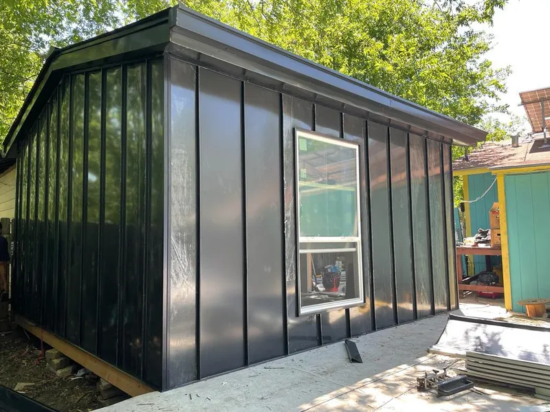 Black standing seam metal wall panels for Metal Roof Installation in Grand Haven